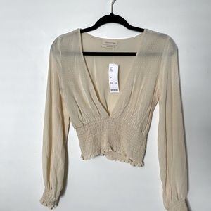 Urban Outfitters cream sheer top